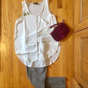 White sleeveless blouse
